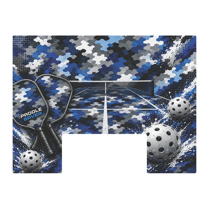 Paddle Saver™ Piece Of The Court skin. The vinyl wrap has pickleball paddles and balls on a blue puzzle piece court background.