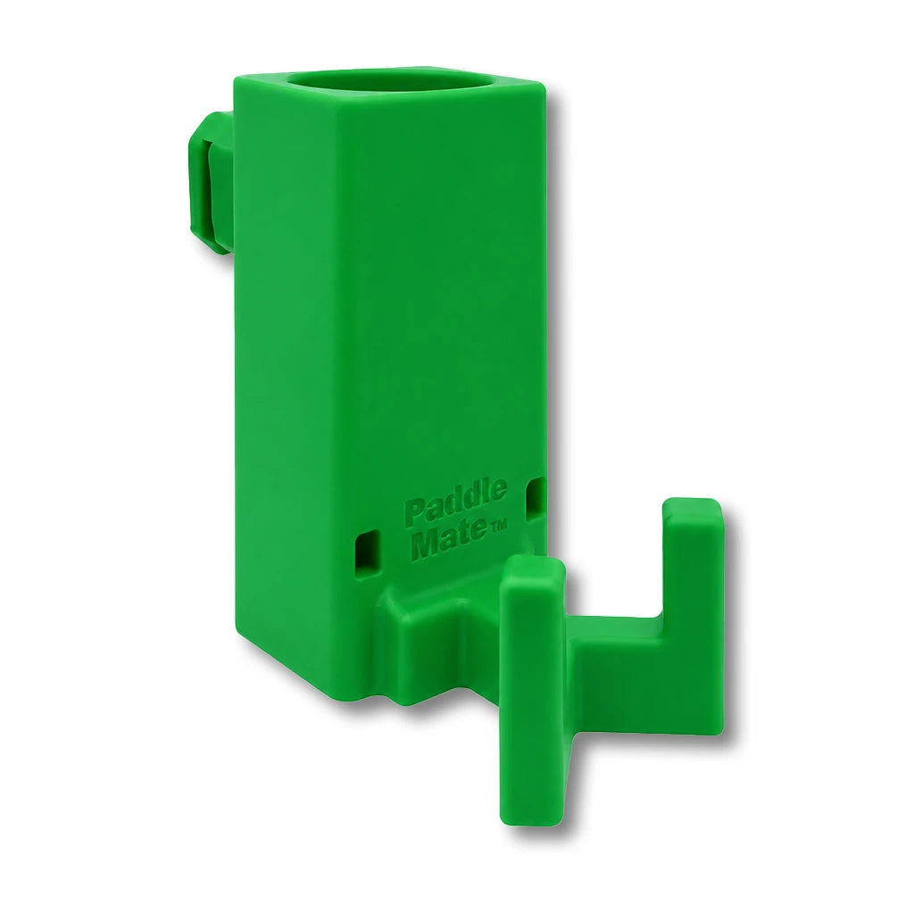 Paddle Mate in green. Patented fence mounted pickleball paddle holder.