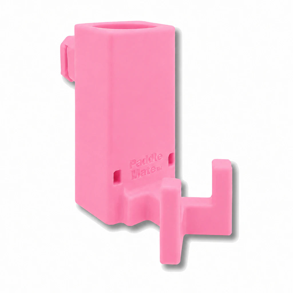 Paddle Mate in pink. Patented fence mounted pickleball paddle holder.