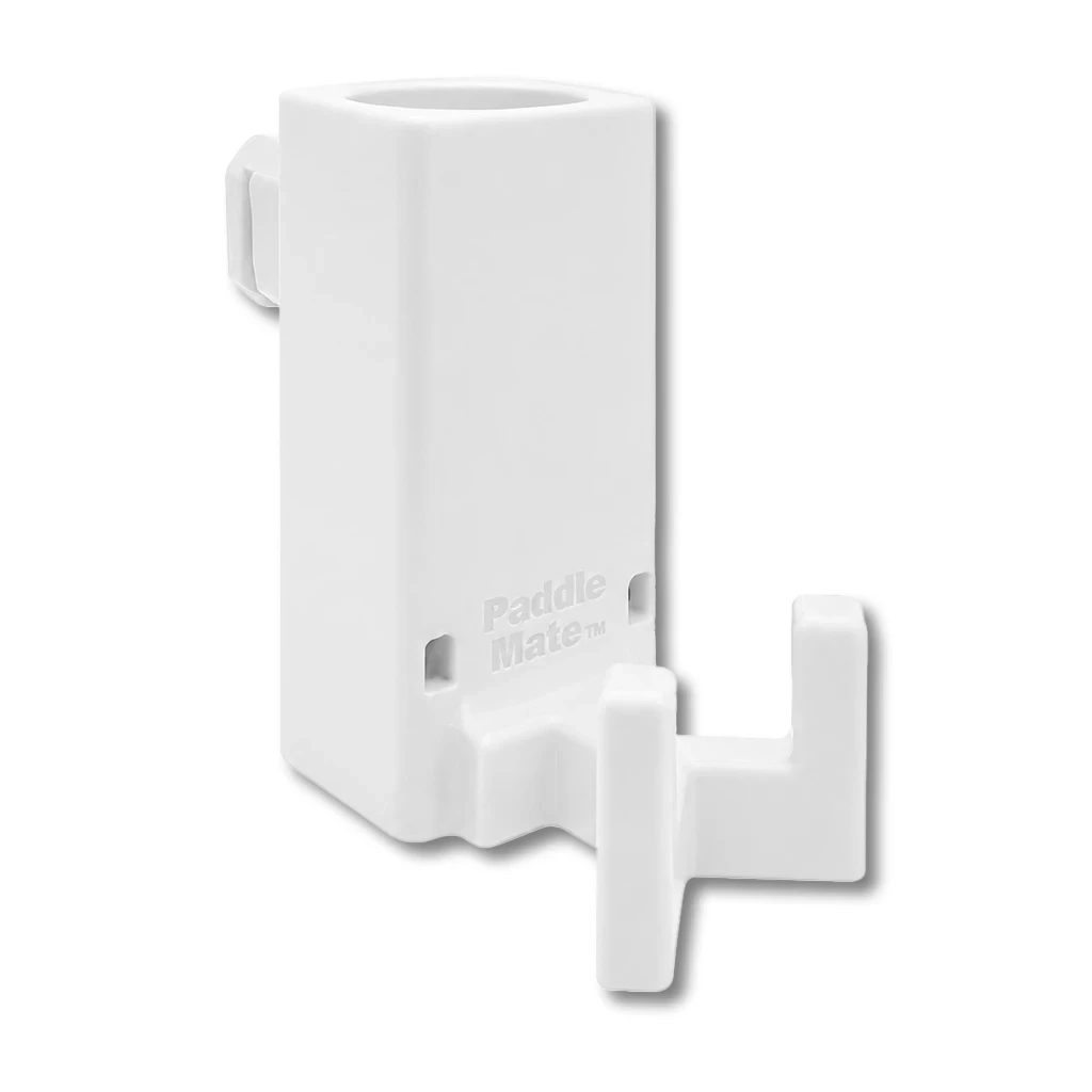 Paddle Mate in white. Patented fence mounted pickleball paddle holder.